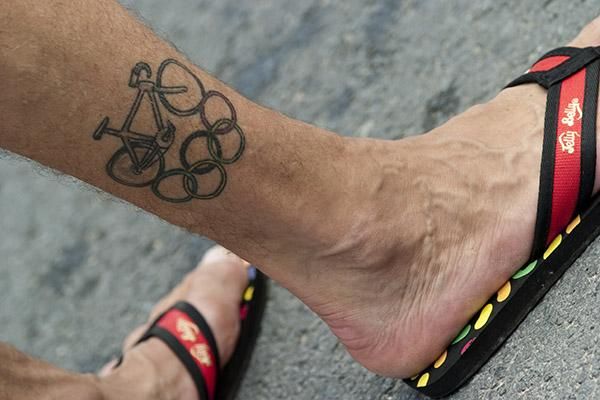 Danny Van Haute, team manager for Jelly Belly, sports the team thongs and a great tattoo as well.