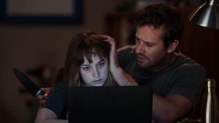 Armie Hammer and Dakota Johnson in Wounds