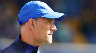 Close-up side view of Chelsea head coach Thomas Tuchel wearing a baseball cap