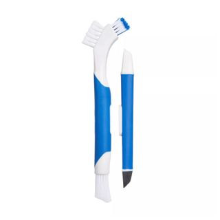 A thin white and blue cleaning brush