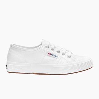 Flat lay image of white trainers