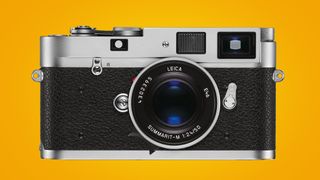 Leica M-A on an orange background