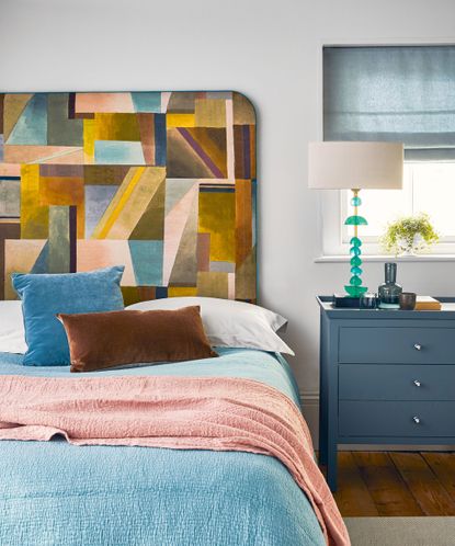 Modern bedroom with colorful headboard