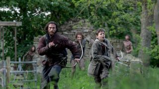 Aaron Taylor-Johnson and Alfie Williams running away from zombies in 28 Years Later