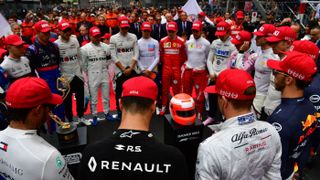 Formula 1 drivers observe a minute’s silence in tribute to Niki Lauda at the 2019 Monaco GP
