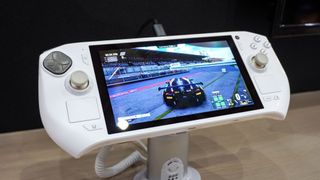 The upgraded Zotac Zone playing a racing game at Computex 2025