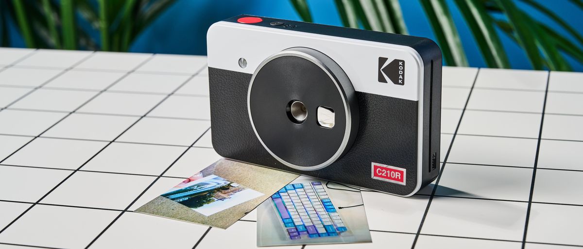 A black and gray Kodak Mini Shot 2 Retro 2-in-1 instant camera and printer