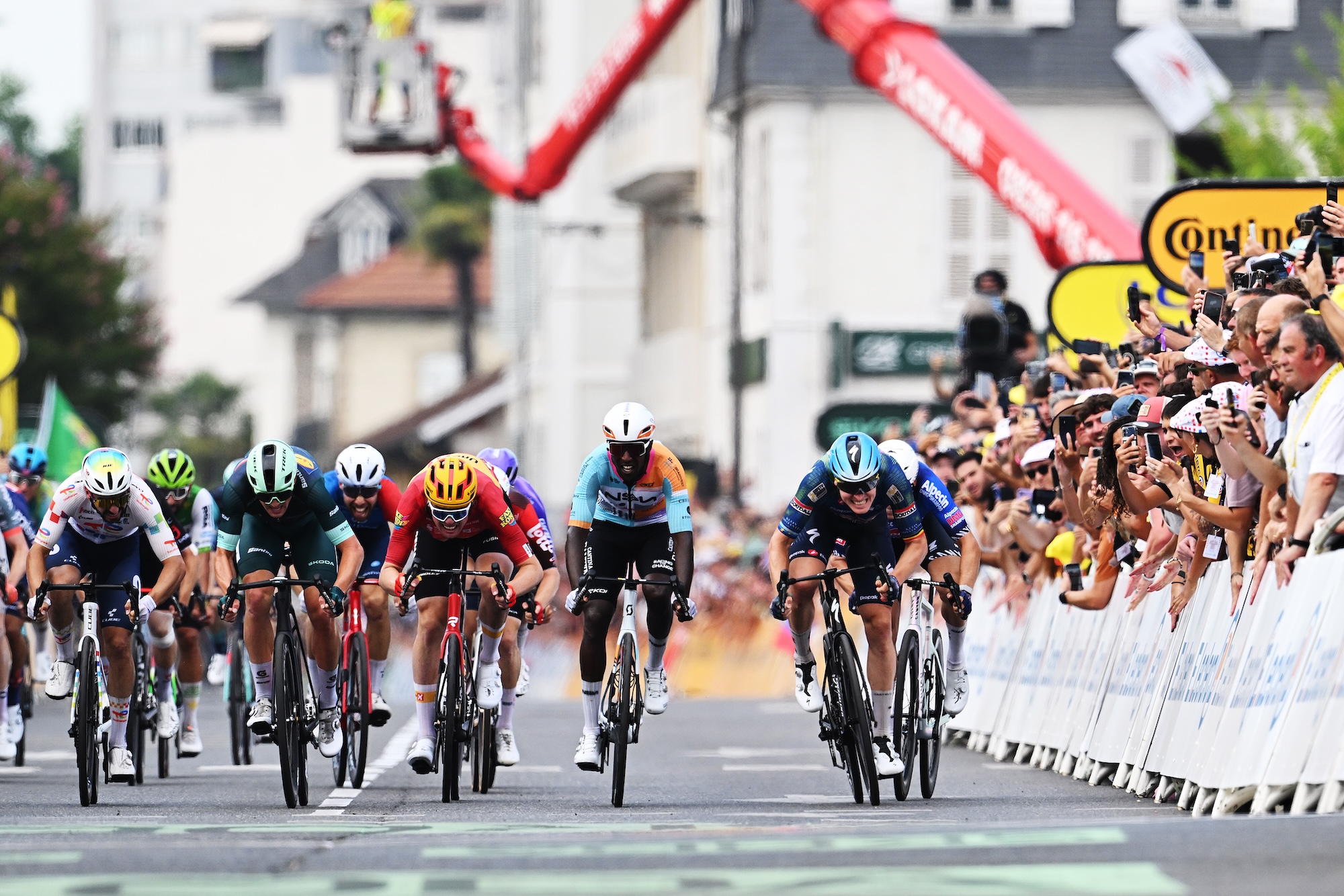 Anthony Turgis of France and Team TotalEnergies, Soren Waerenskjold of Norway and Team Uno-X Mobility, Mads Pedersen of Denmark and Team Lidl - Trek - Green Sprint Jersey, Biniam Girmay of Eritrea and Team NSN Cycling and Tim Merlier of Belgium and Team Soudal Quick-Step sprint at finish line during the 113th Tour de France 2026, Stage 5 