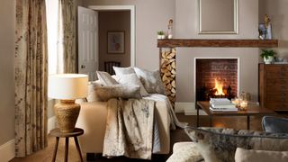 cosy sitting room with open fireplace