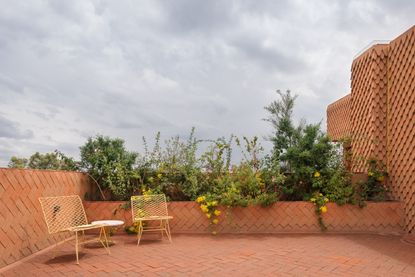 brick clad terrace in mexico city housing block by pedro y juana