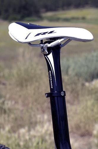 A shortie seat post gives enough seat adjustment that it's not necessary to trim the seat tube.