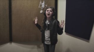 A young girl sings Dream Theater