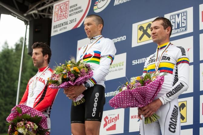 Elite men's marathon Worlds podium: Alban Lakata (Austria), Christoph Sauser (Switzerland), Hector Leonardo Paez Leon (Colombia)