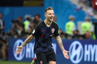 Ivan Rakitic of Croatia celebrates scoring the winning penalty in a shootout during the 2018 FIFA World Cup Russia Quarter Final match between Russia and Croatia at Fisht Stadium on July 7, 2018 in Sochi, Russia. (Photo by Matthew Ashton - AMA/Getty Images)