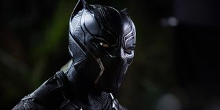 Black Panther surveying the area moments after arriving to recover Nakia and a group of young girls in Black Panther