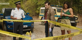Marlon cordons off a crime scene in Death in Paradise season 11
