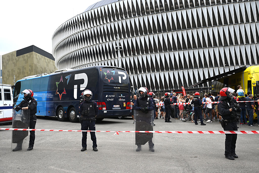 BILBAO, SPAIN - SEPTEMBER 03: The police (Ertzaina) guard the bus of Team Israel - Premier Tech after the La Vuelta - 80th Tour of Spain 2025, Stage 11 a 157.4km stage from Bilbao to Bilbao / Due to incidents at the finish line, the official times for the GC were taken at 3km from the finish line, there was no stage winner / #UCIWT / on September 03, 2025 in Bilbao, Spain. (Photo by Dario Belingheri/Getty Images)
