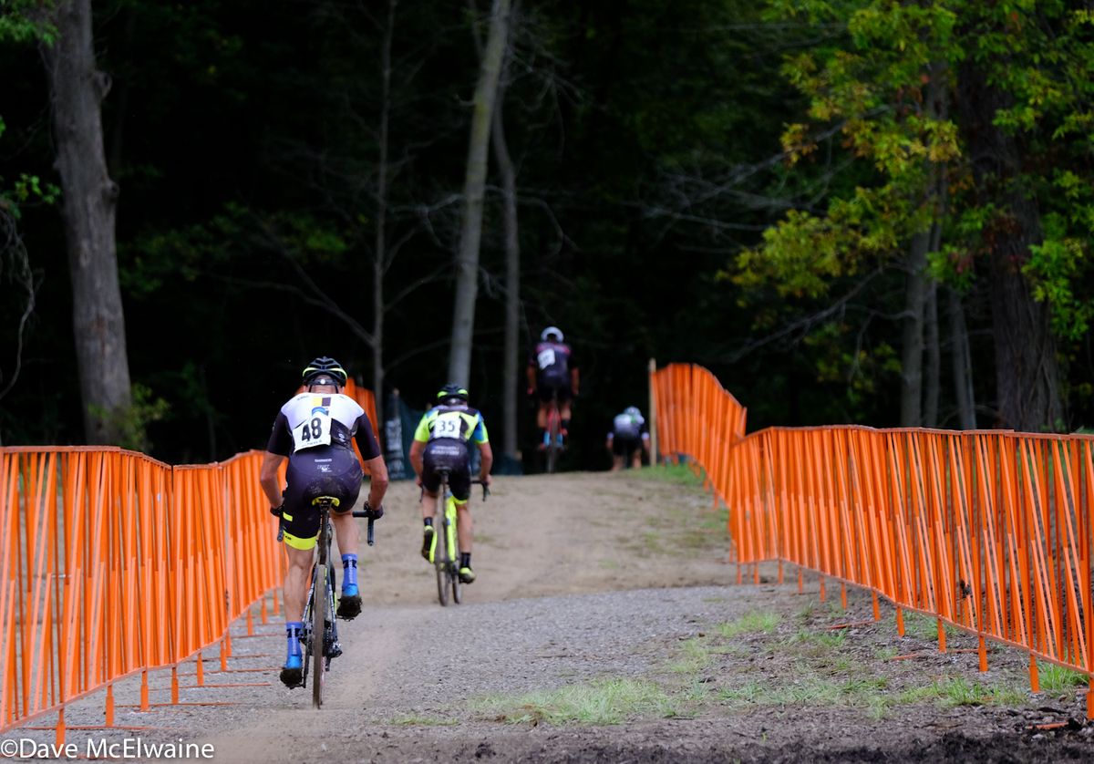Riders entered a shady wooded section of the course halfway through each lap.