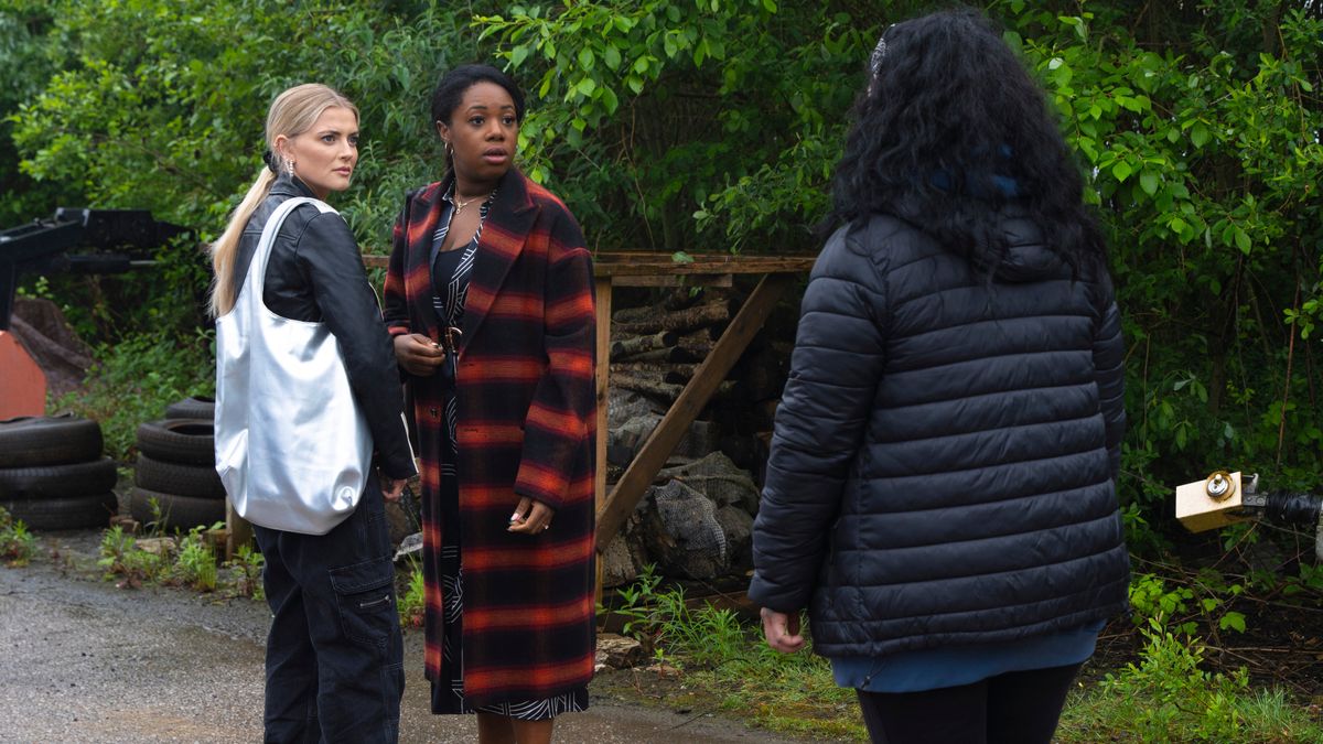 Dee-Dee Bailey and Bethany Platt look shocked as they talk to a woman.