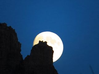 Sky watcher Austin Moloughney sent in a photo of the moon rising behind Vimy Mountain, Alberta, Canada, on August 18, 2013. 
