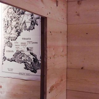 Wooden wall with map hanging