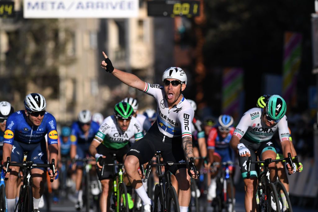 ROQUETAS DE MAR SPAIN FEBRUARY 14 Arrival Stijn Steels of Belgiumand Team Deceuninck QuickStep Giacomo Nizzolo of Italy and Team Team Qhubeka Assos Celebration Martin Laas of Estonia and Team BORA hansgroheduring the 34th Clsica de Almeria 2021 a 1833km race from Pueblo de Vicar to Roquetas de Mar ClasicaAlmeria21 on February 14 2021 in Roquetas de Mar Spain Photo by Tim de WaeleGetty Images