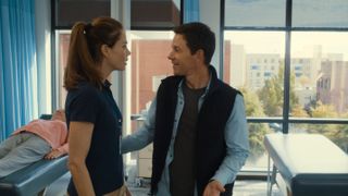 This image is of actors Michelle Monaghan and Mark Wahlberg in the movie, "The Family Plan."