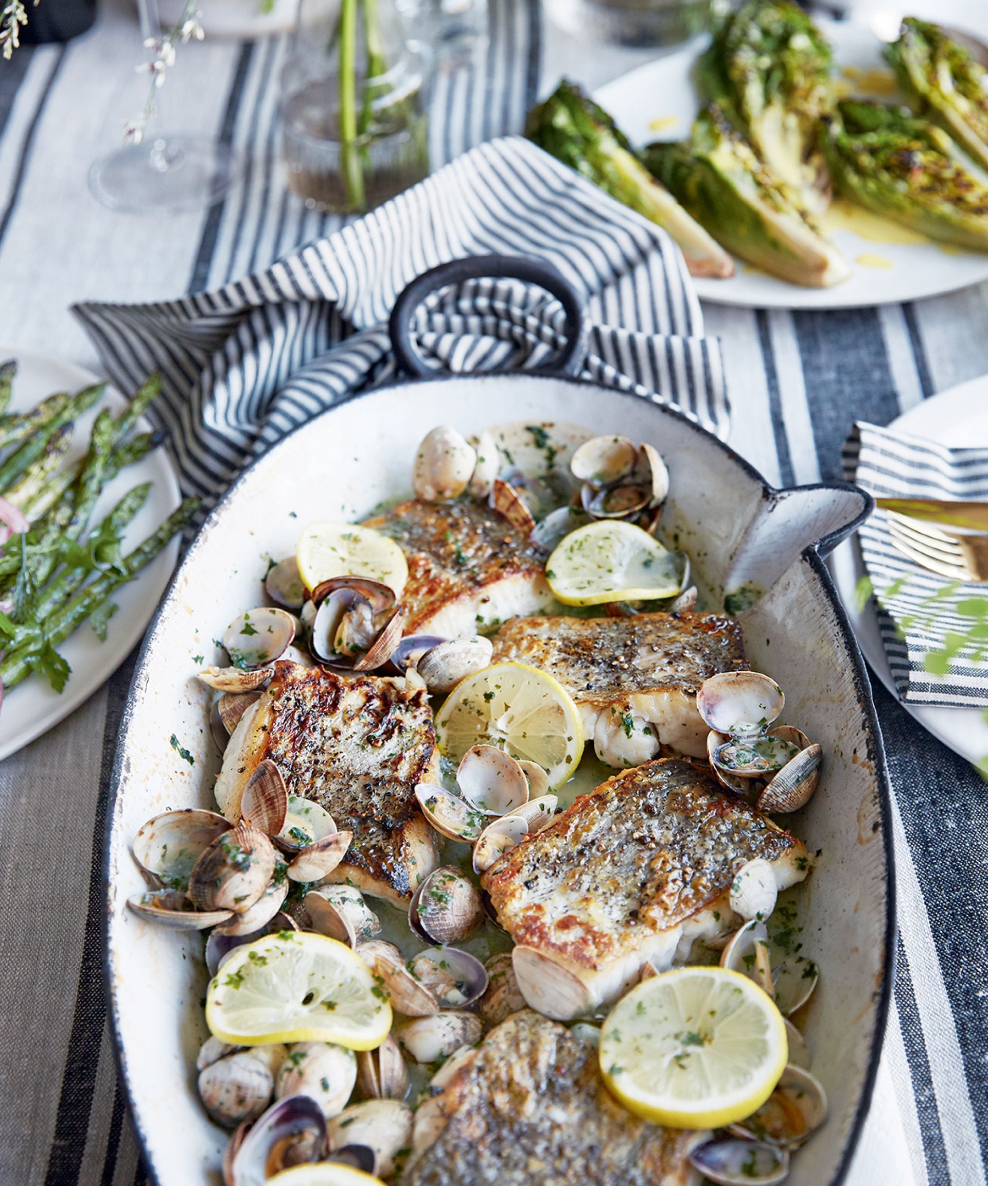 Hake and clams recipe image on an Easter table