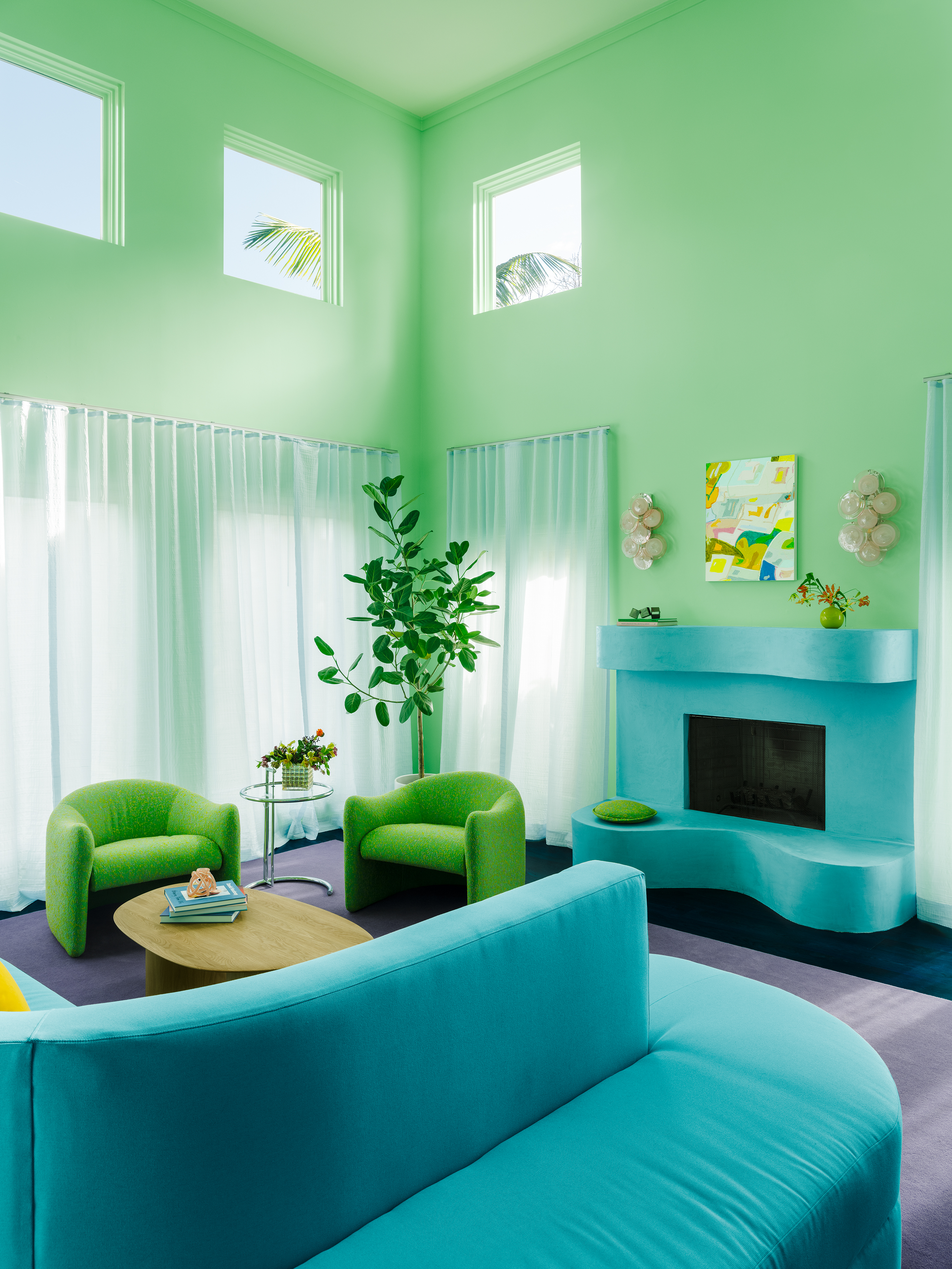 A neotenic living room with sculptural forms and playful tones of green and blue
