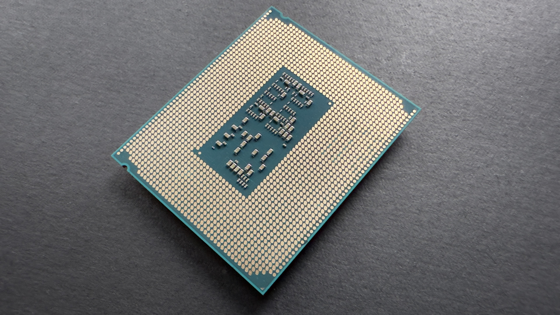 A photo of an Intel Core Ultra 5 245K processor against a dark background