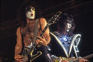 American musicians Paul Stanley (left) and Ave Frehley of the group Kiss perform at the International Ampitheater, Chicago, Illinois, September 22, 1979.