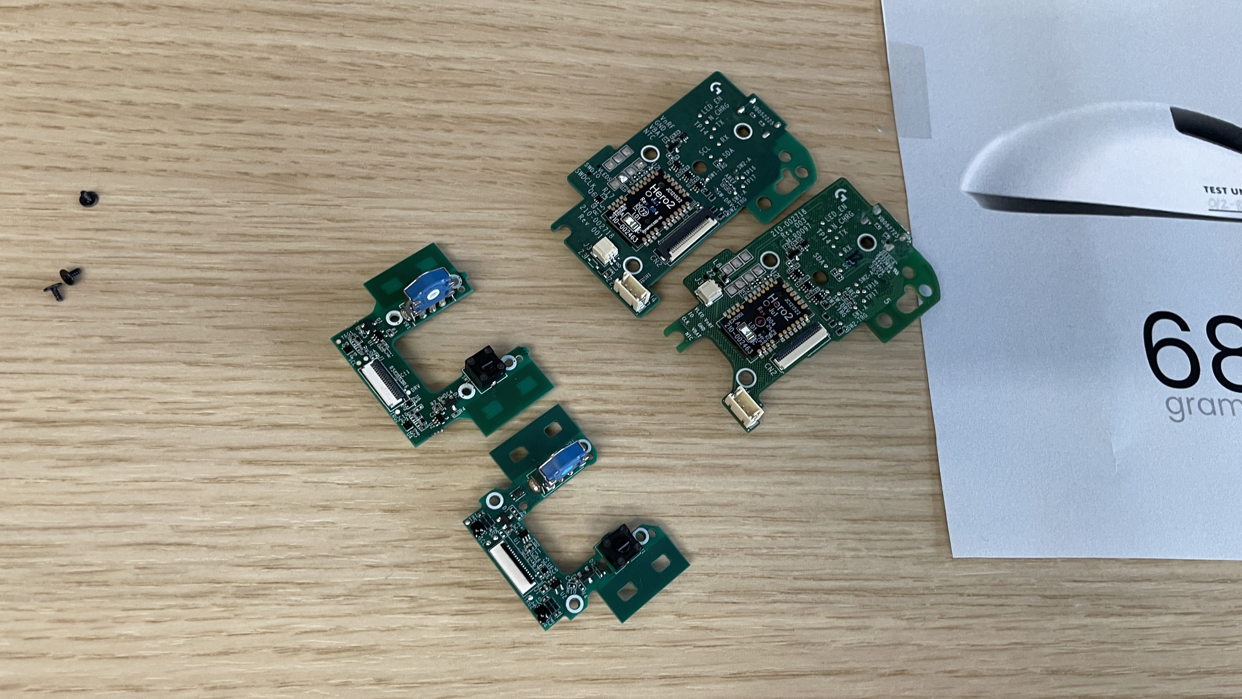 PCBs for the Logitech G Pro X2 Superstrike gaming mouse, one which has more cut out of it for weight reduction.