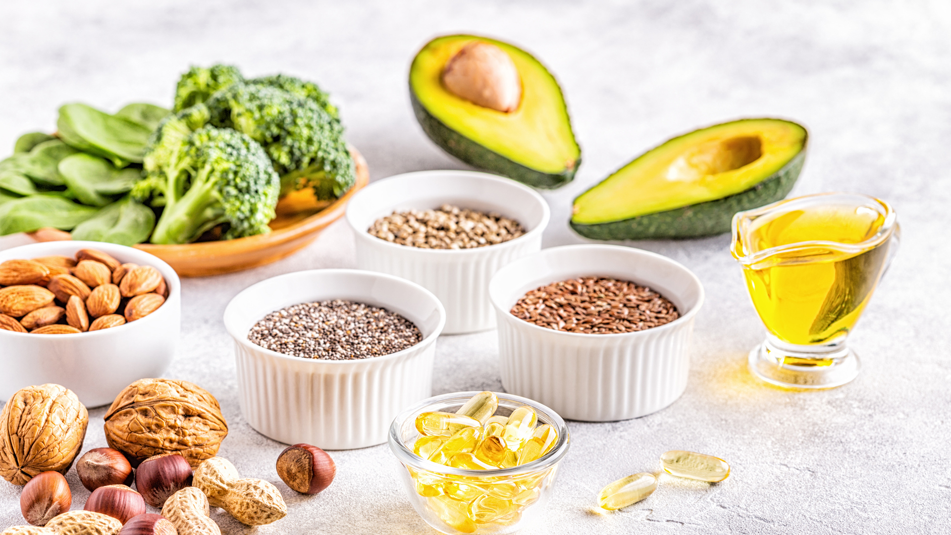 healthy sources of unsaturated fat including olive oil, nuts, seeds and avocado