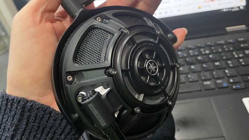 A selection of headphones, including the Audio-Technica ATH-ADX7000 worn by a man in Paris 