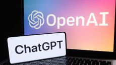 A phone with the ChatGPT logo and a laptop with the OpenAI logo