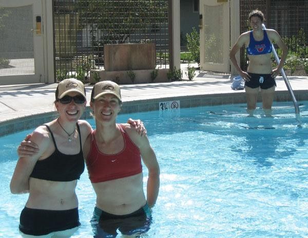 No, this pool is not heated, and yes, these girls are nuts. Katheryn, Helen and Laura ice the legs.