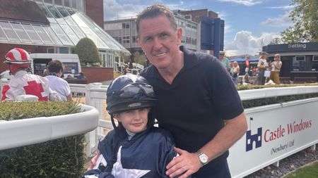 AP McCoy with young jockey at Pony Club racing day at Newbury