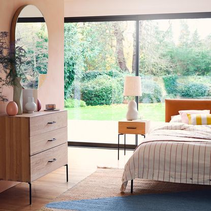 bedroom with white lamp light with wooden cabinet