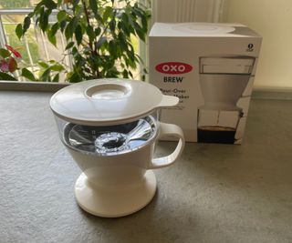 OXO Brew Pour-Over on the countertop with the OXO Brew Pour-Over box in the background