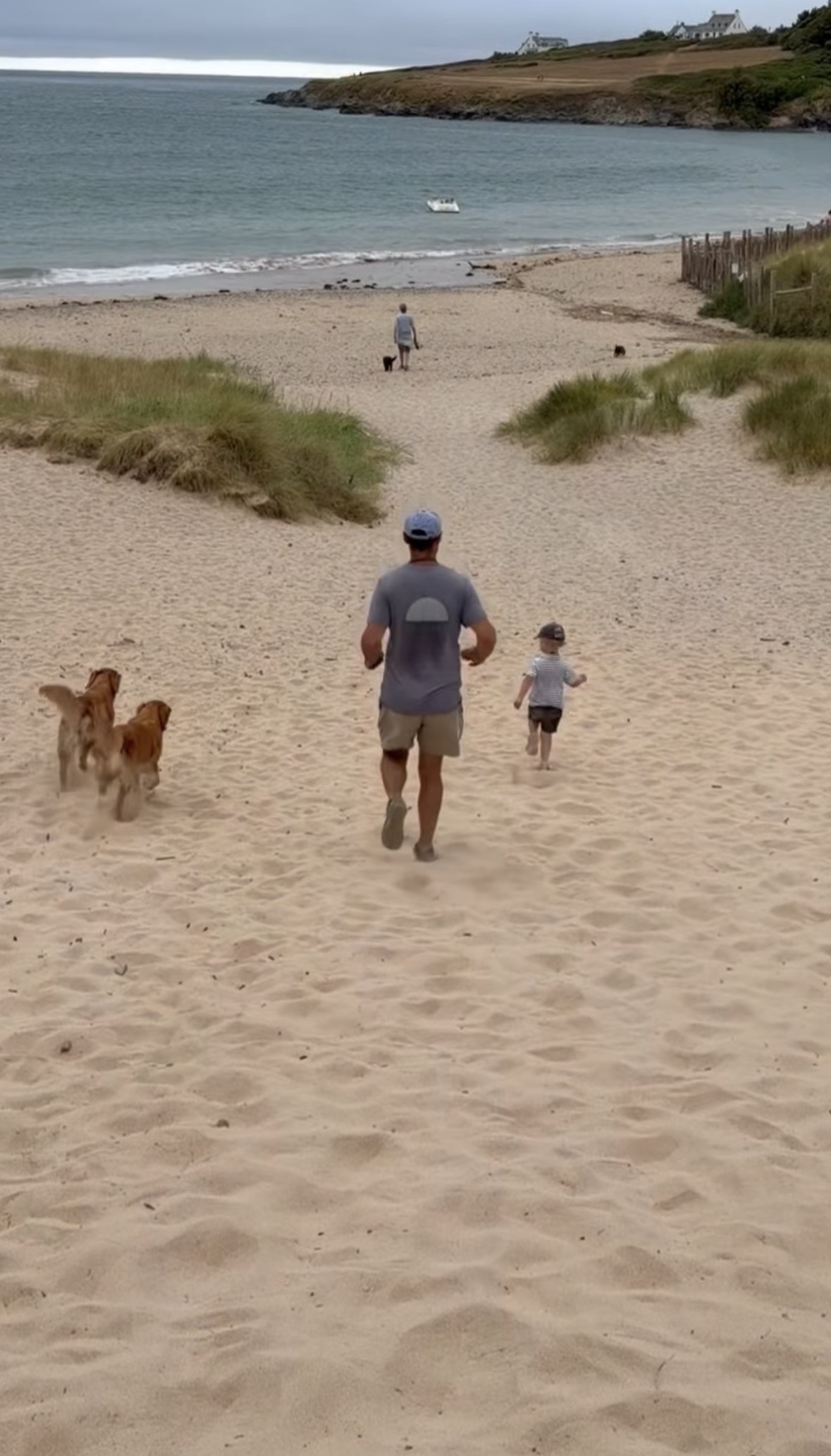 James Middleton running down a beach