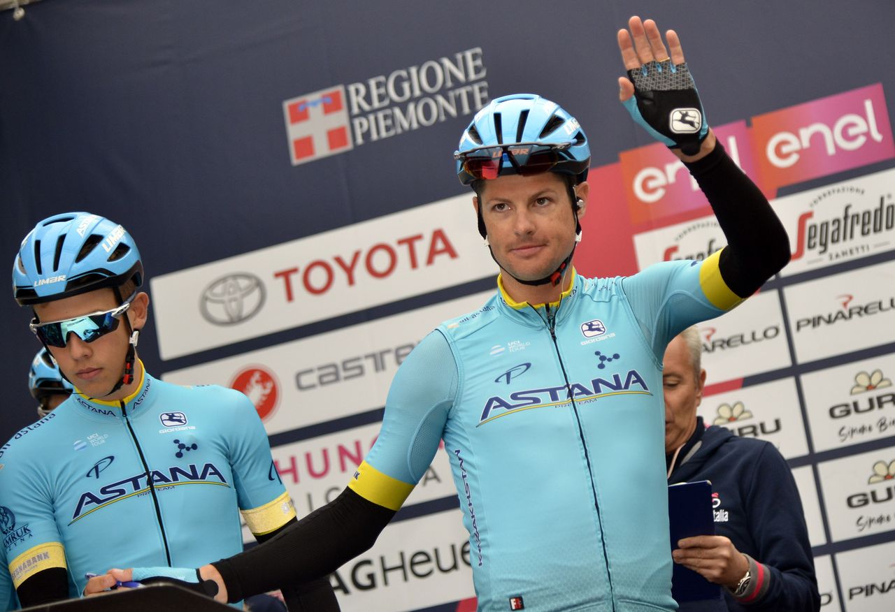 Jakob Fuglsang (Astana) waves to the crowds at the start of Milano-Torino