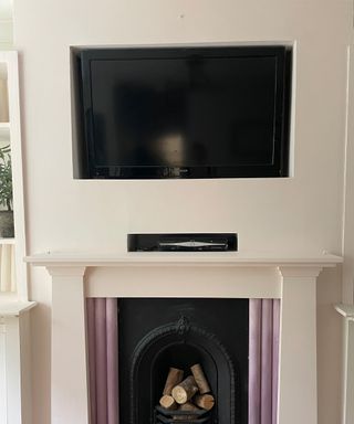 wall mounted tv over mantle