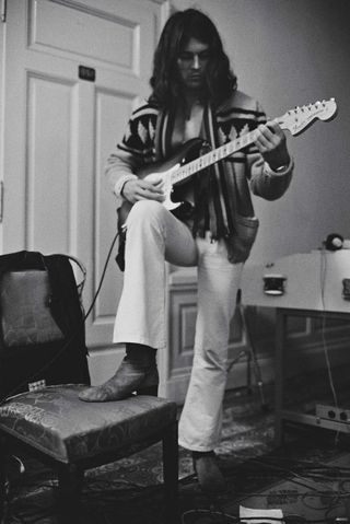 Ian Gillan playing guitar