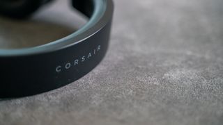 Corsairs HS55 Wireless on a gray desk mat