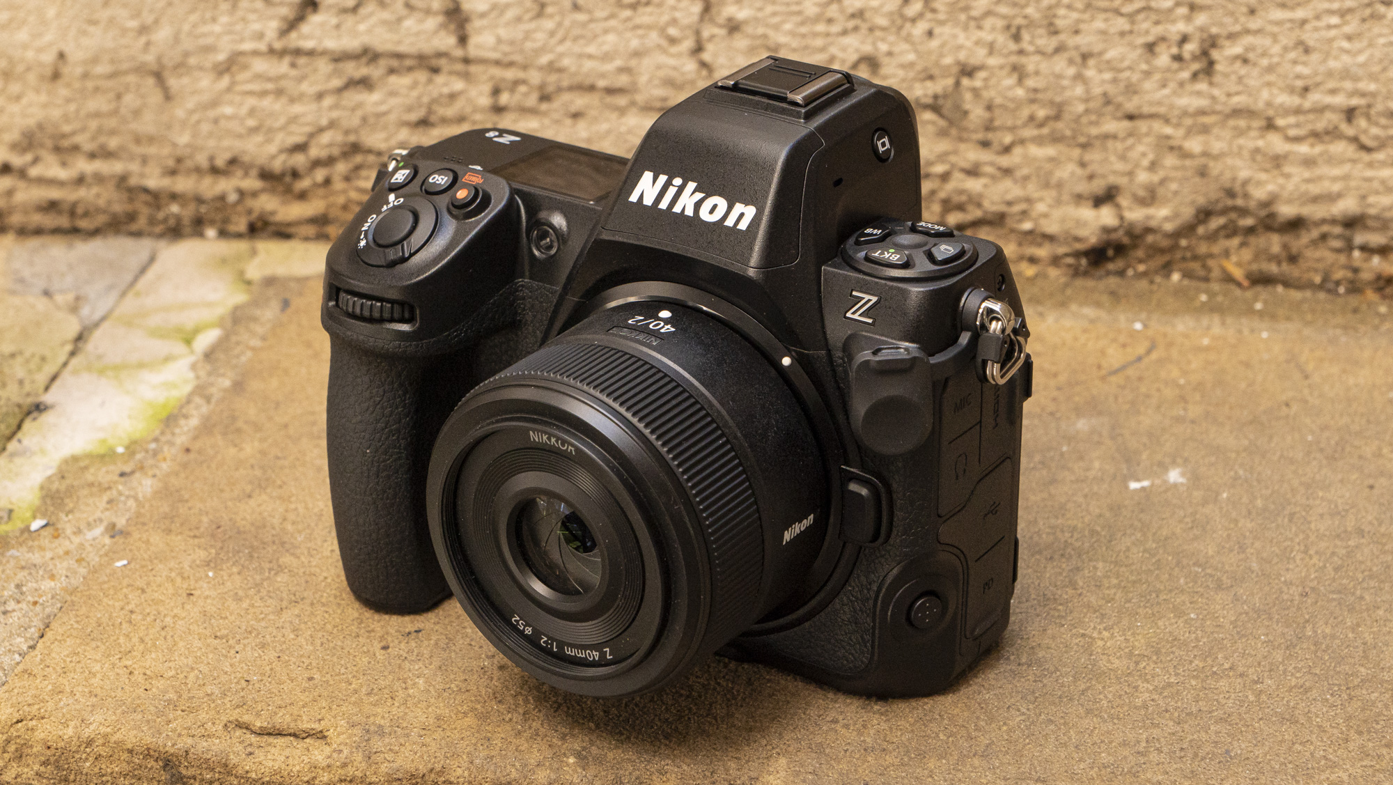 Nikon Z8 camera outside on the ground front view