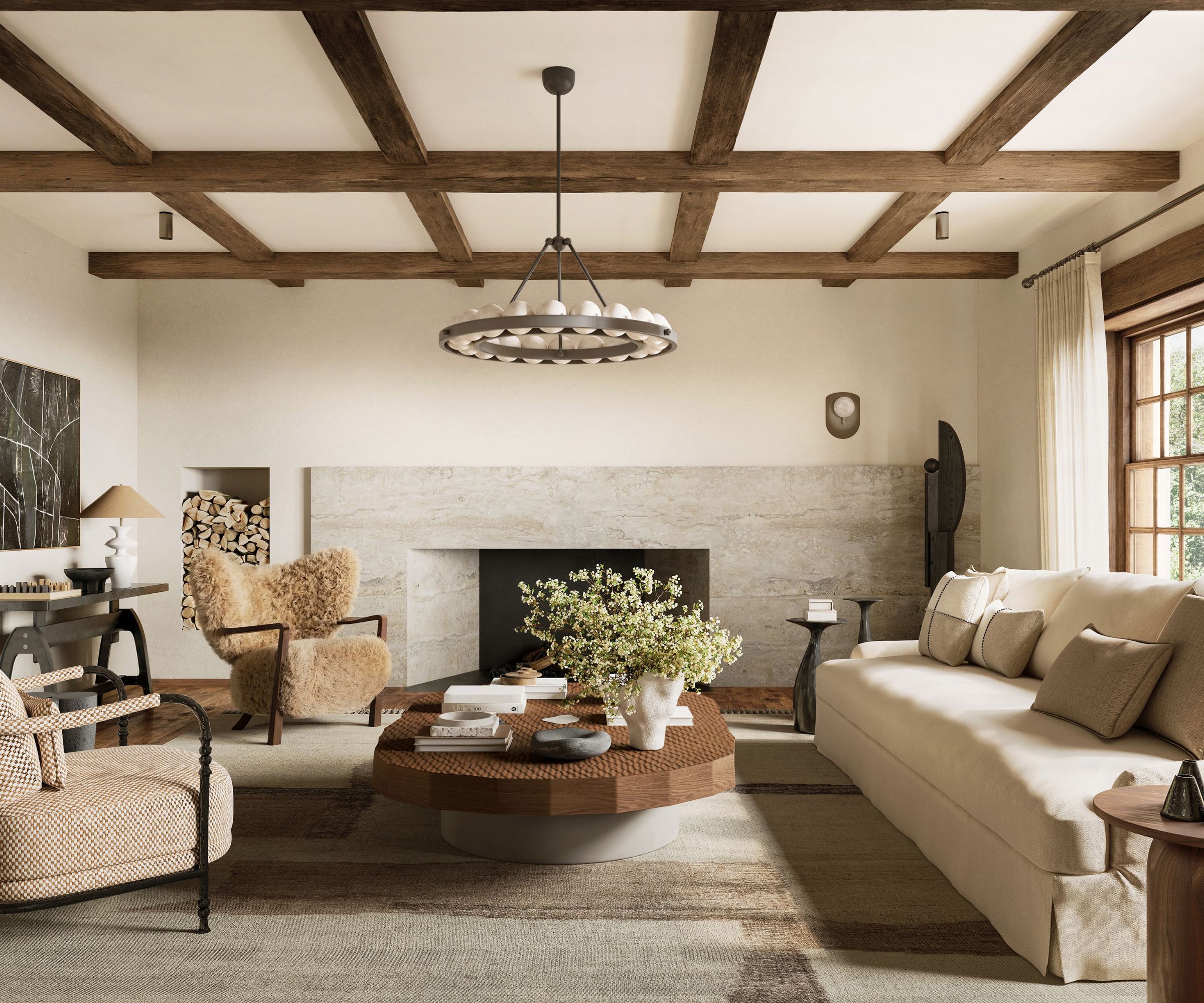 Living room with beams and large fireplace, wood coffee table, cream sofa and fleece armchairs