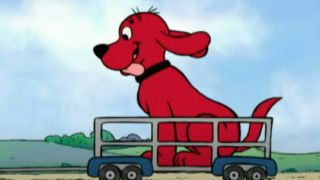 Clifford riding in a wagon in Clifford the Big Red Dog.