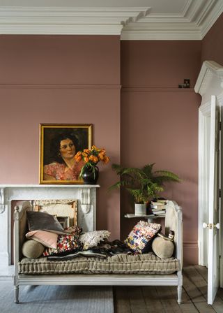 Traditional room with Sulking Room pink paint and a day bed