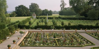 The recently restored parterre and wilderness containing an obelisk at Hanbury Hall, Worcestershire. &copy;Stephen Robson / National Trust Images