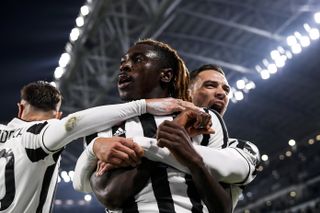 Moise Kean is mobbed after scoring the game's only goal